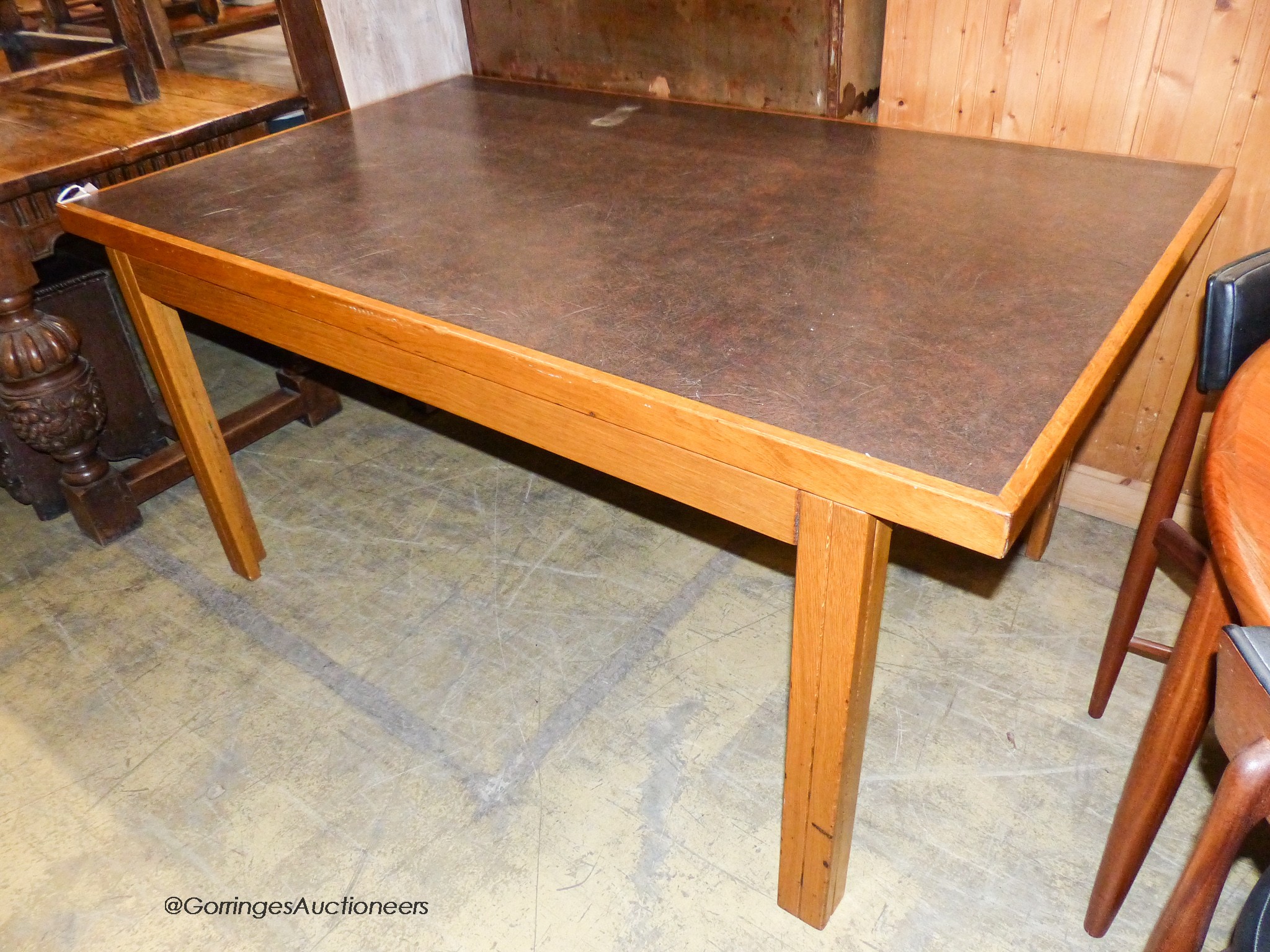 A mid century design Moss & Co rectangular oak writing table circa 1960, length 156cm, depth 95cm, height 75cm